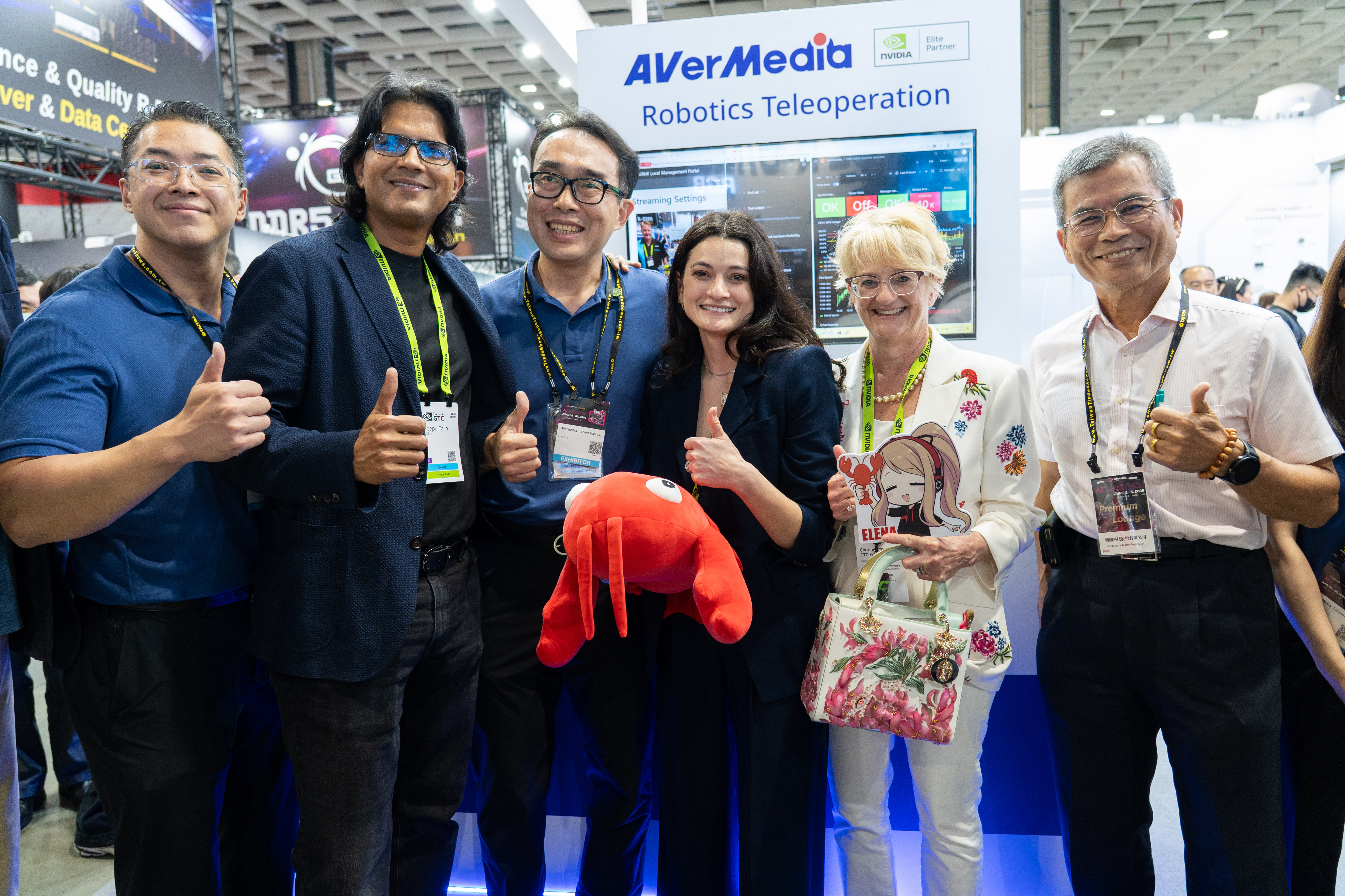 Lori Huang and Madison Huang visit the AVerMedia booth, showcasing NVIDIA-powered solutions at COMPUTEX 2026